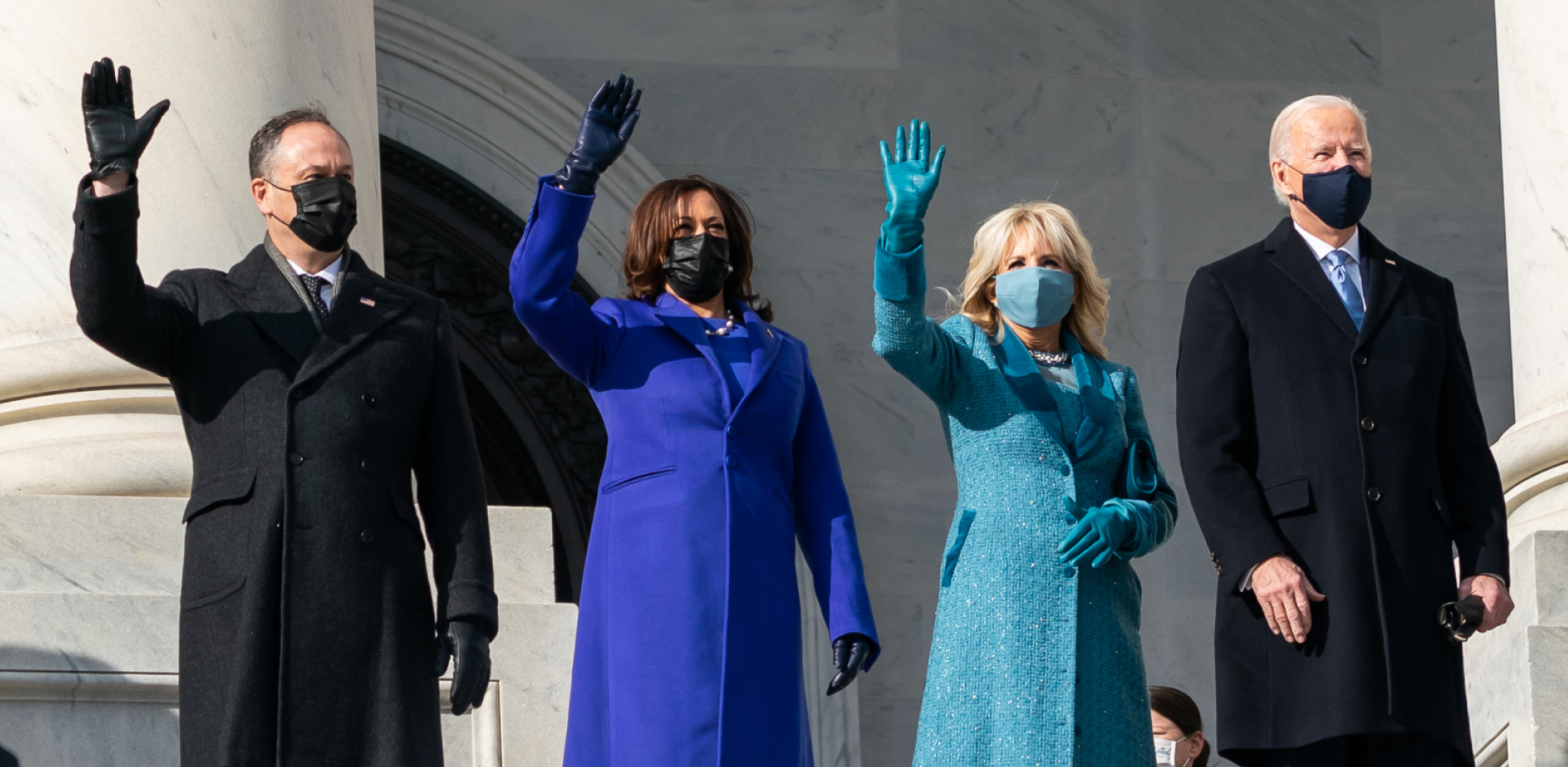 Left to Right: Dough Emhoff, Vice President Harris, Jill Biden, and President Biden. Waving on Inauguration Day