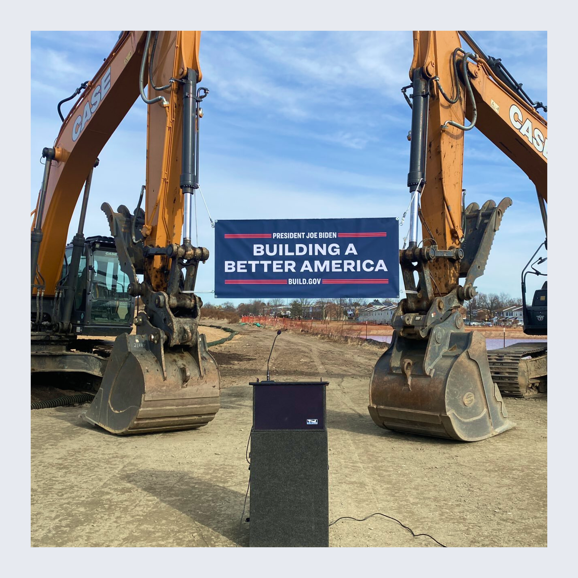 Building a Better America branding on a banner at a breaking ground ceremony